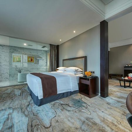 Shanghai New Century Manju Hotel Luoshan @Sniec Экстерьер фото