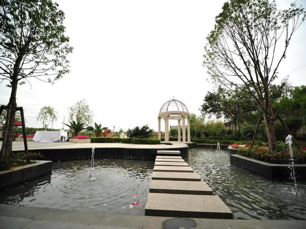 Shanghai New Century Manju Hotel Luoshan @Sniec Экстерьер фото