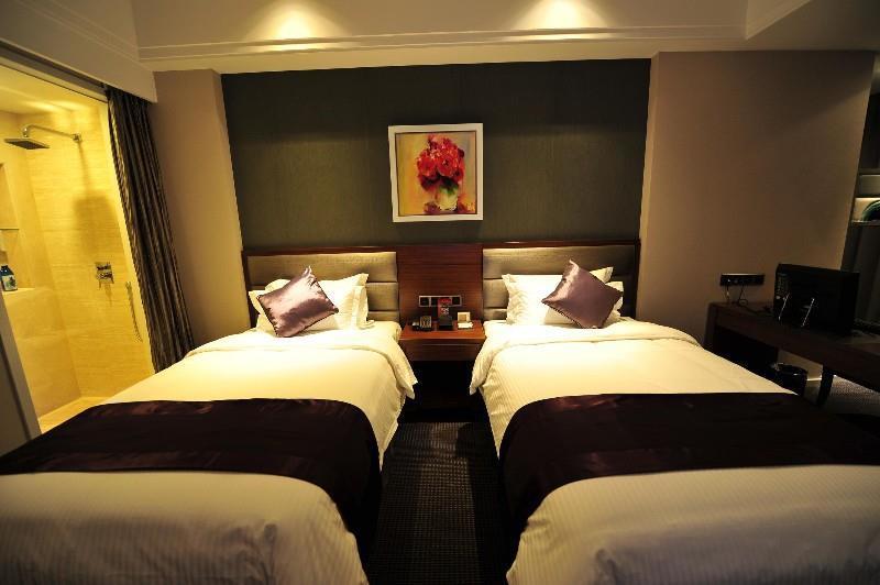 Shanghai New Century Manju Hotel Luoshan @Sniec Номер фото